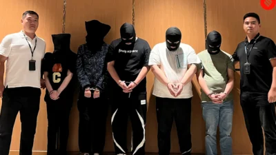 China executes 11 members of Myanmar-based scam syndicate, state media say.